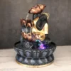 Buddha Tabletop Waterfall Fountain placed on a table